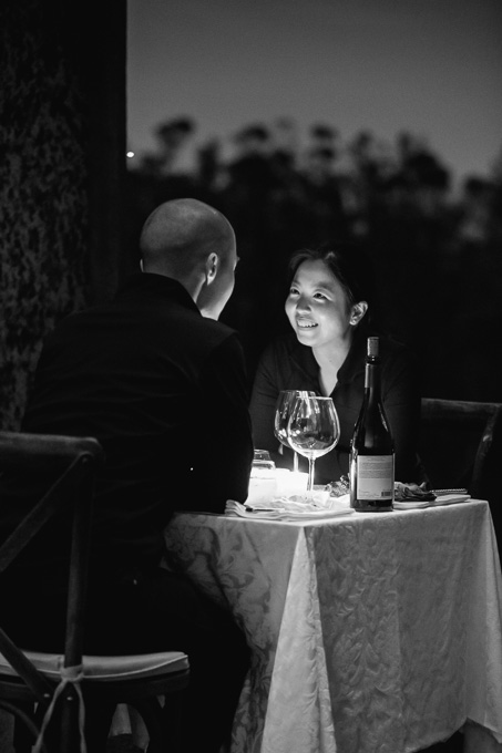 newly engaged couple enjoying their romantic dinner prepared by private chefs
